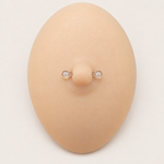 Clear nipple retainer displayed on a silicone demonstration model