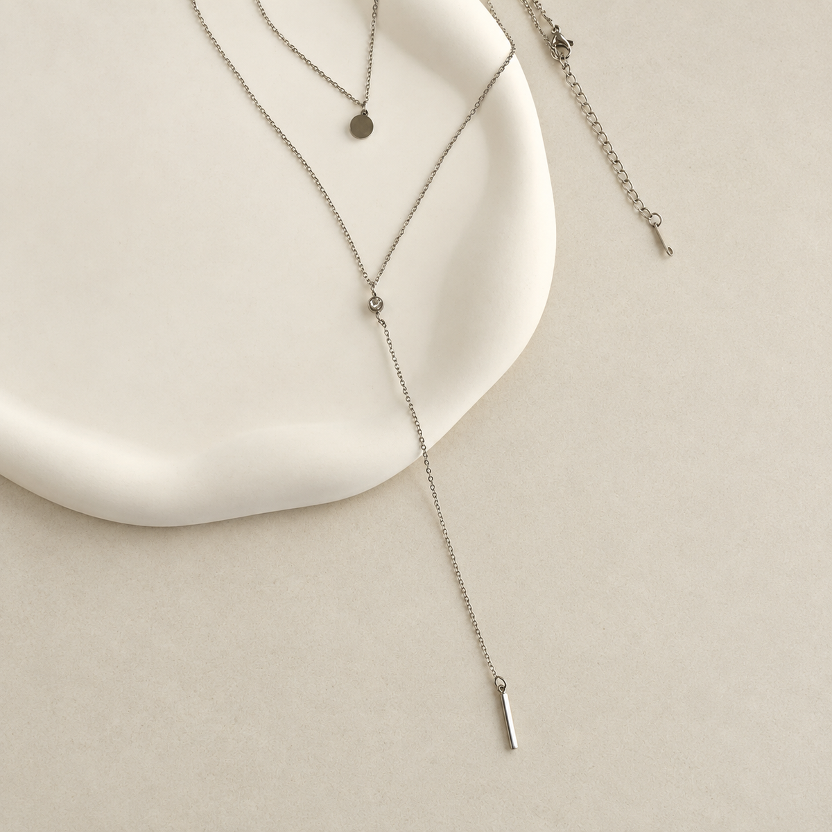 Silver lariat necklace pendant detail