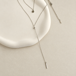 Silver lariat necklace pendant detail