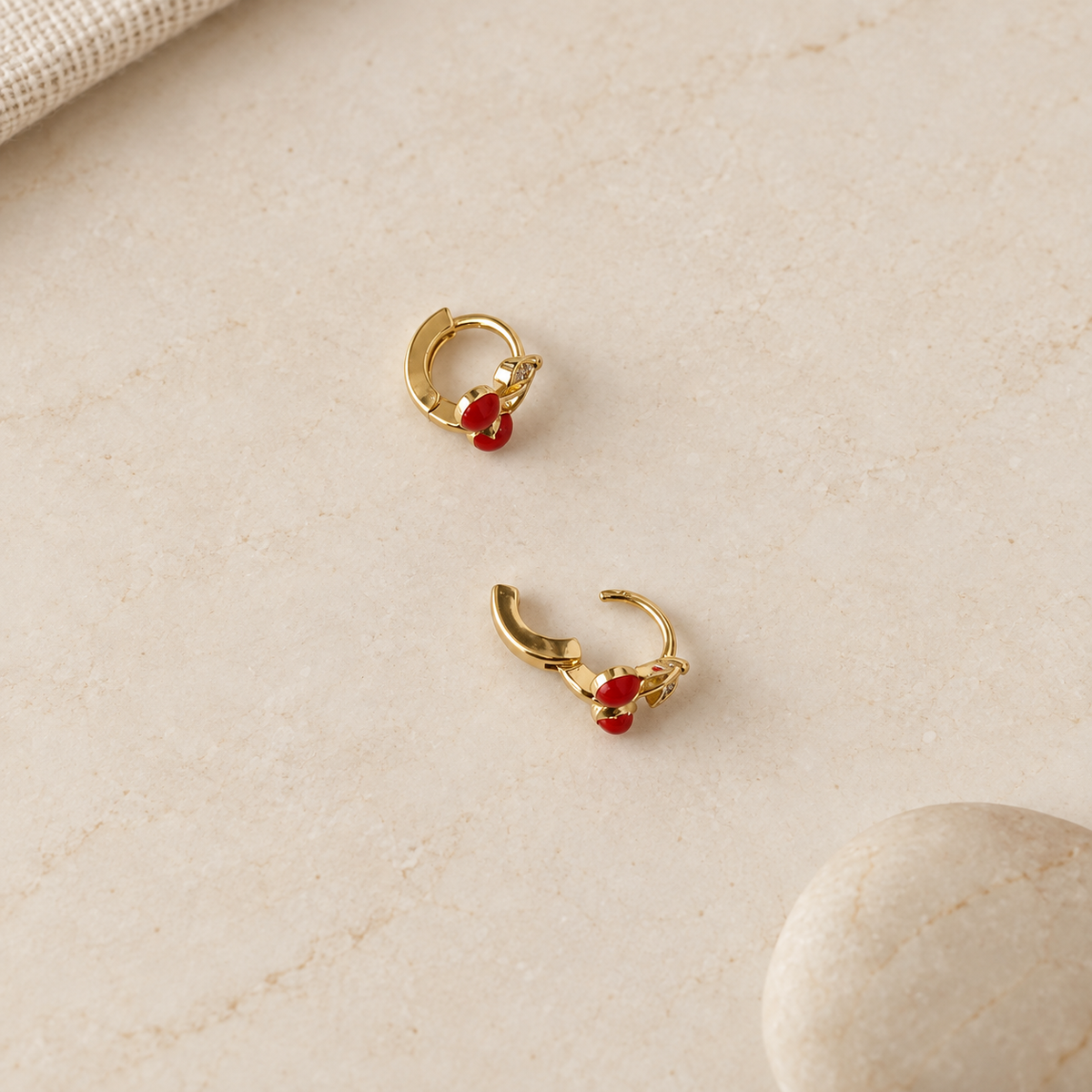 Cherry hoop earrings showing the hinged fastening — Toku LONDON