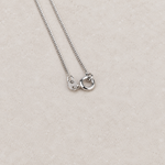 Solitaire necklace chain clasp detail