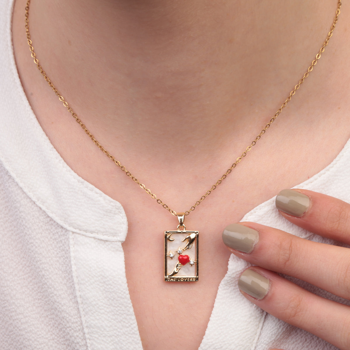 Gold Lovers tarot pendant necklace worn
