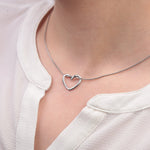 Silver heart pendant necklace - worn on model