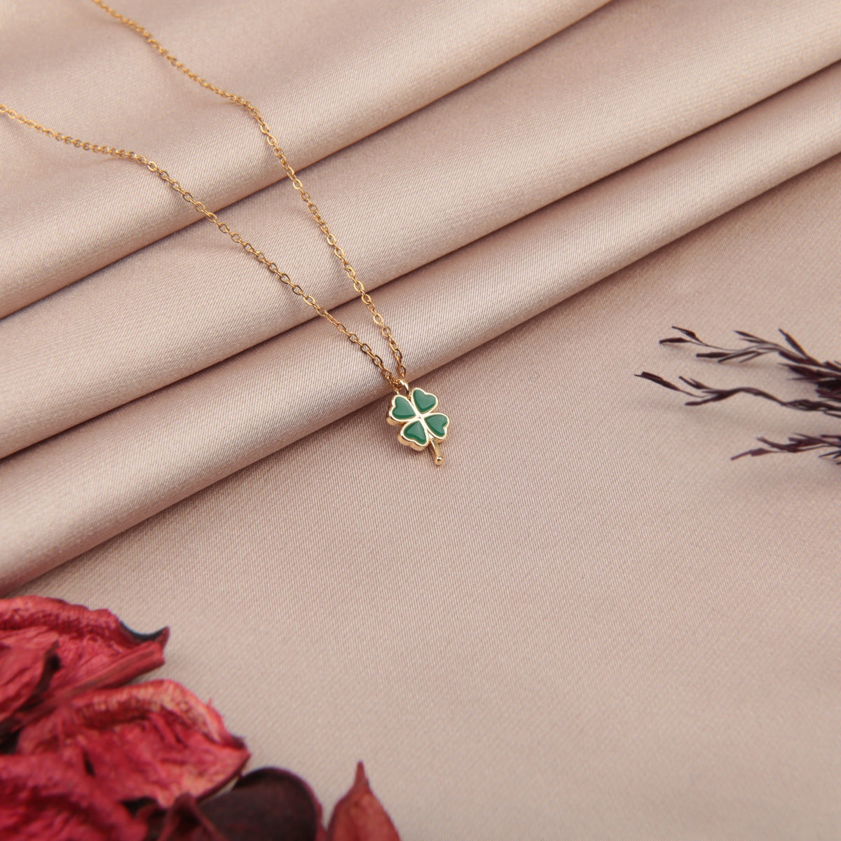 Gold green four-leaf clover pendant necklace