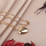 Gold heart photo locket necklace