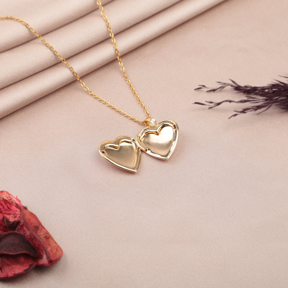 Gold heart photo locket necklace opened