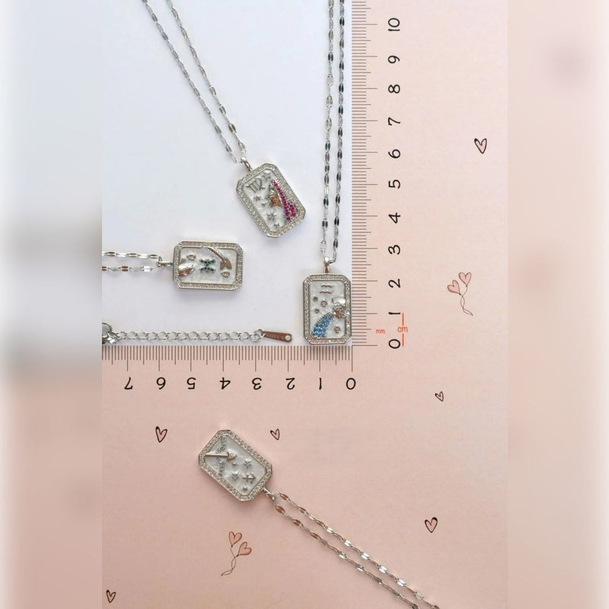 Silver zodiac pendant necklace - size reference