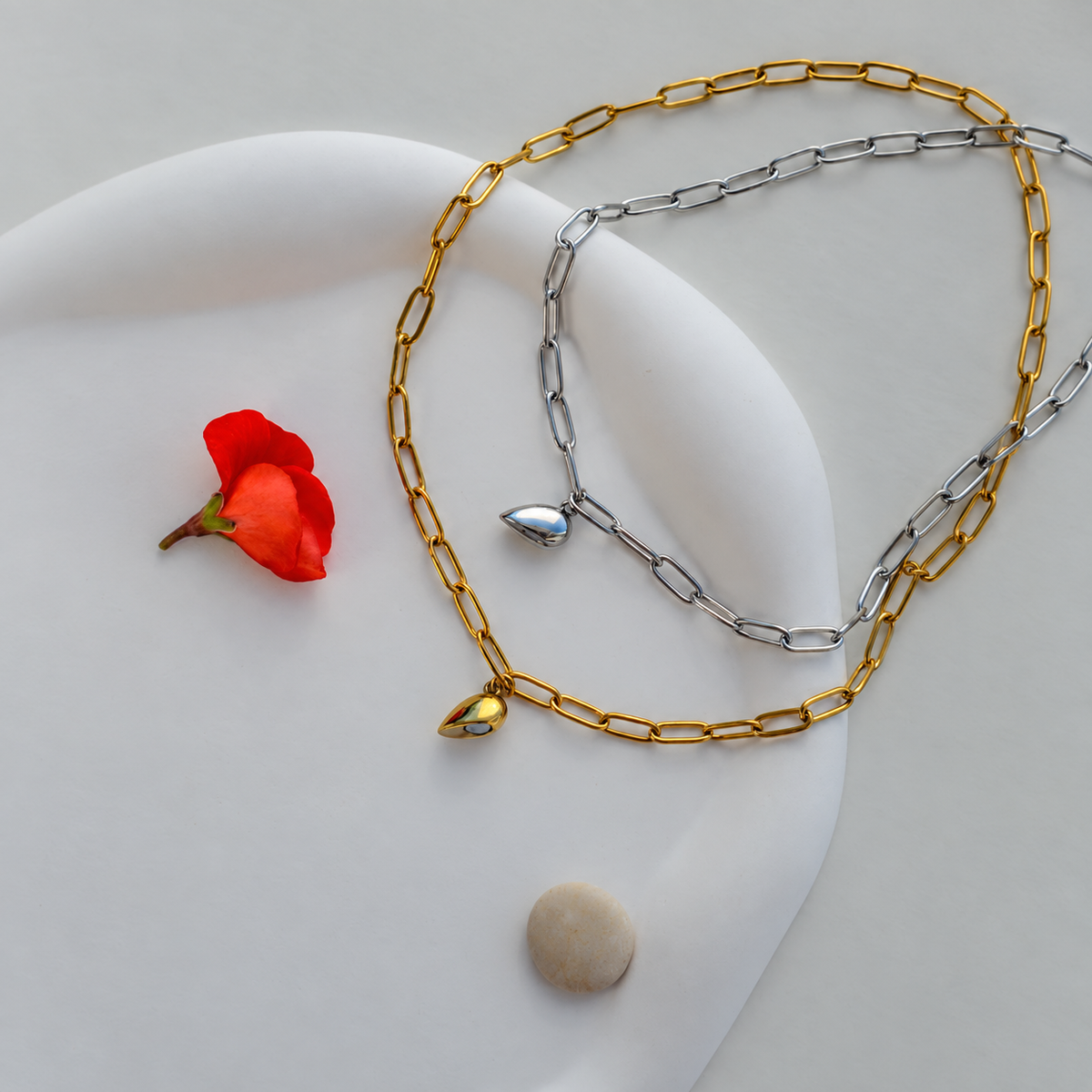 Mixed gold and silver magnetic heart couple necklaces separated