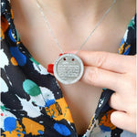 Silver Ayatul Kursi pendant necklace worn, close-up