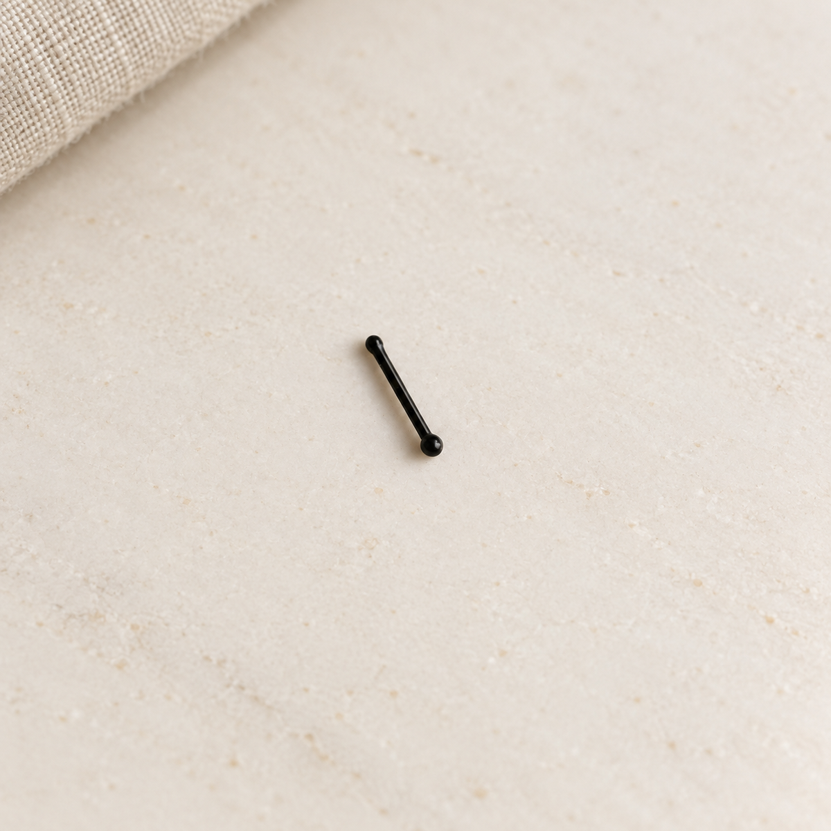 Black ball nose stud, product view