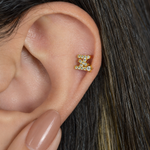 Gold zircon letter Z piercing stud shown on the ear