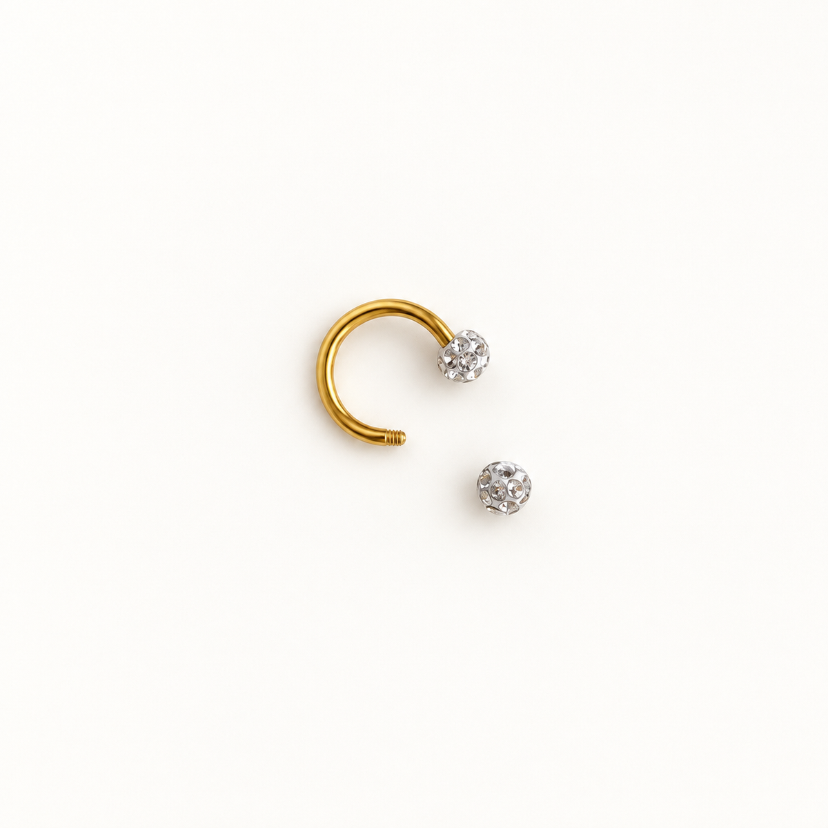 Gold horseshoe barbell with removable crystal ball