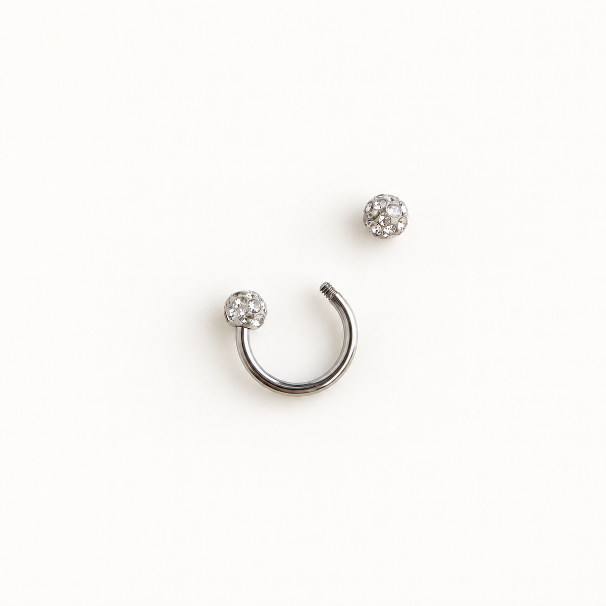 Silver horseshoe barbell with removable crystal ball