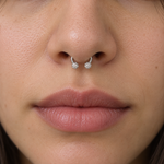 Silver crystal ball horseshoe worn in septum piercing