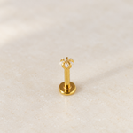 Gold star piercing stud upright detail