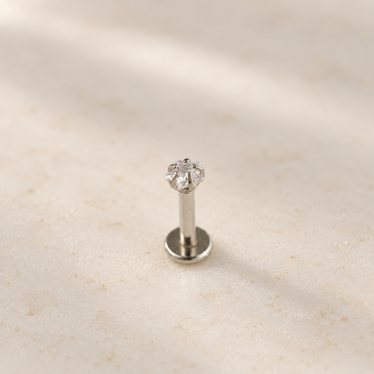 Silver star piercing stud upright detail