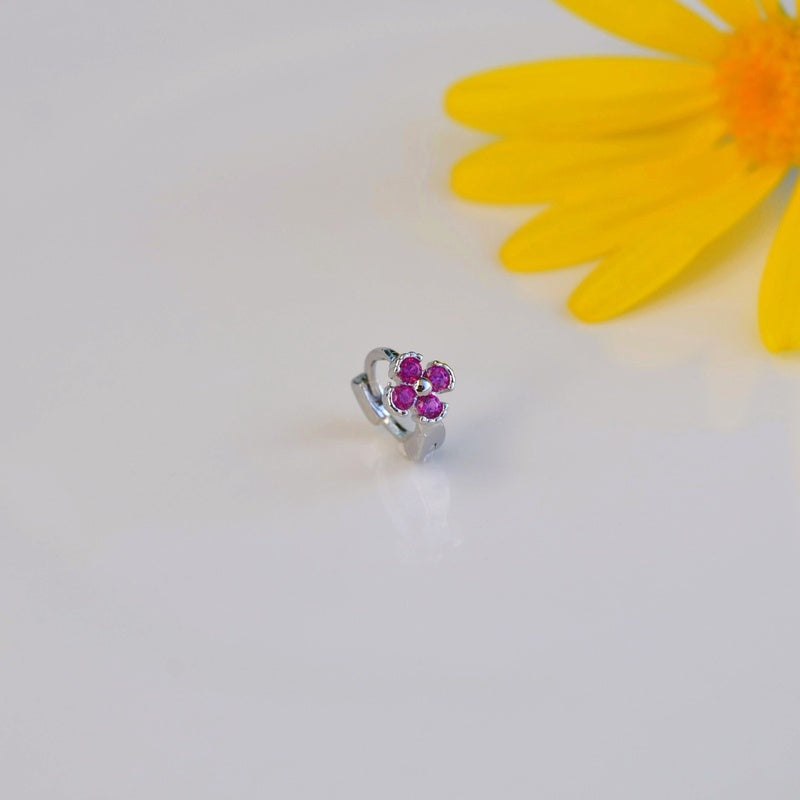 Silver flower hoop with four fuchsia pink stones