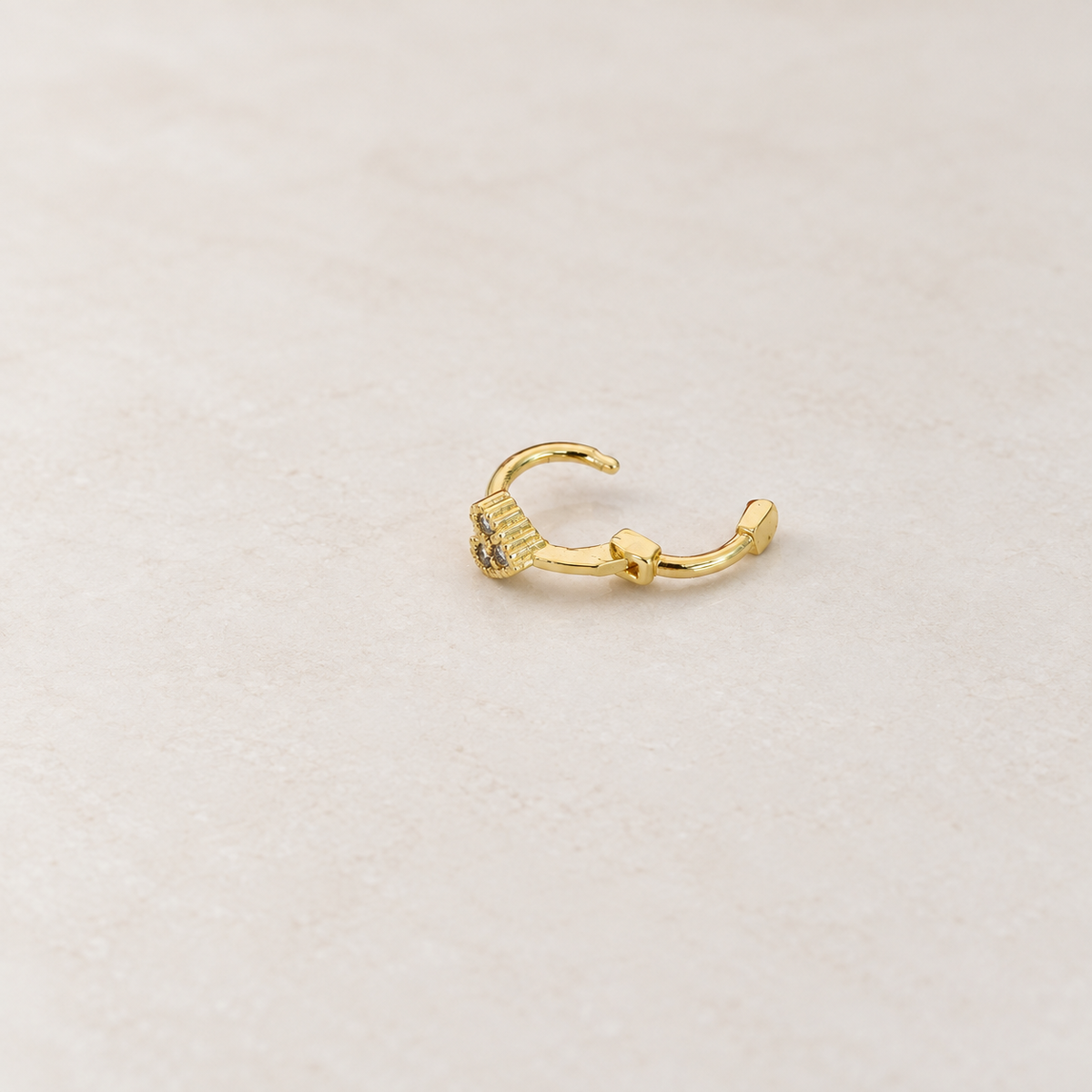 Gold heart hoop earring open clasp detail