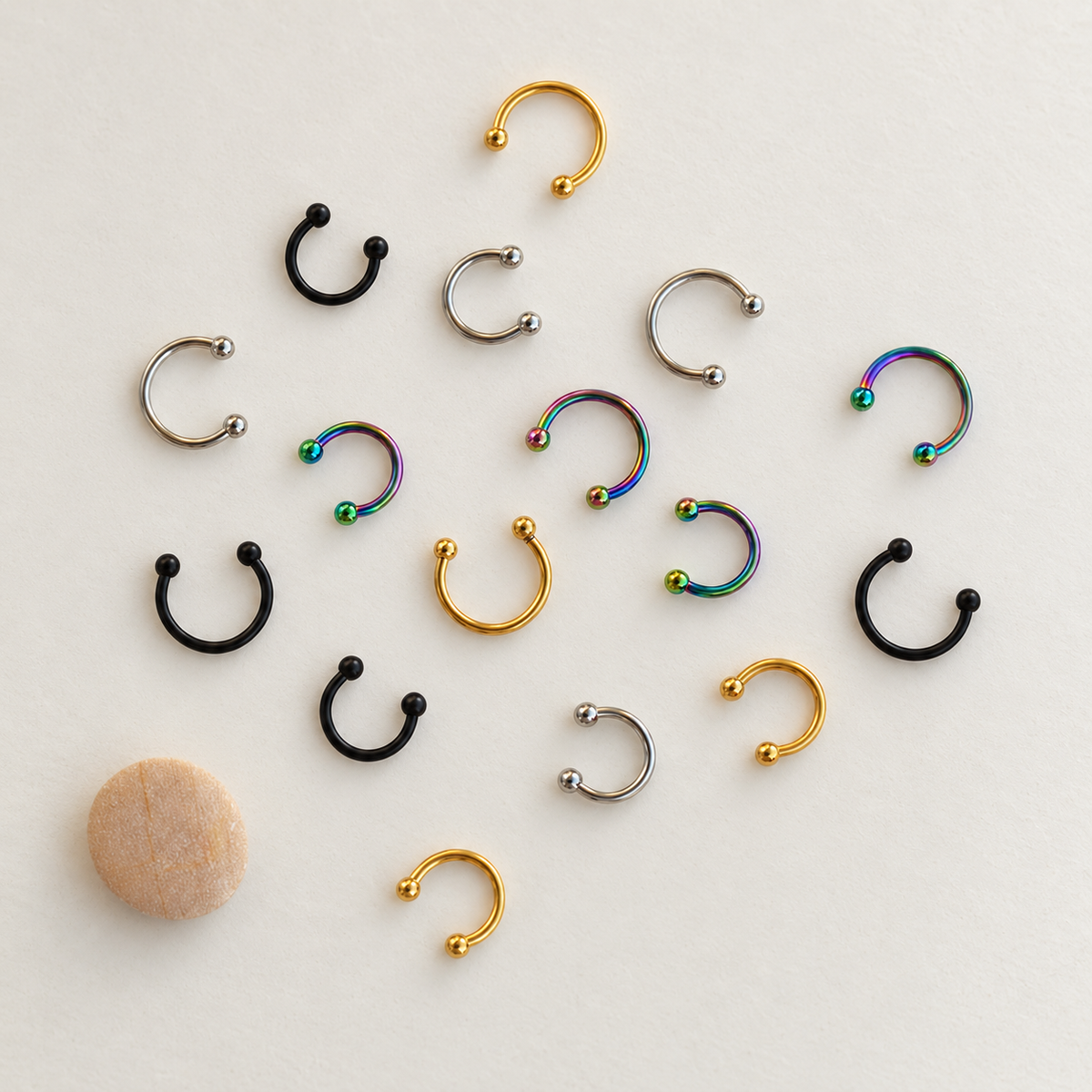 Mini horseshoe circular barbells in gold, silver, black and hologram