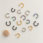 Mini horseshoe circular barbells in gold, silver, black and hologram