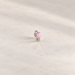 Silver hoop ring with a pink heart