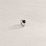 Silver hoop ring with a black heart