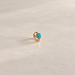 Gold hoop ring with a blue heart