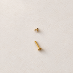 Gold solitaire piercing stud with top removed, showing the post — Toku LONDON