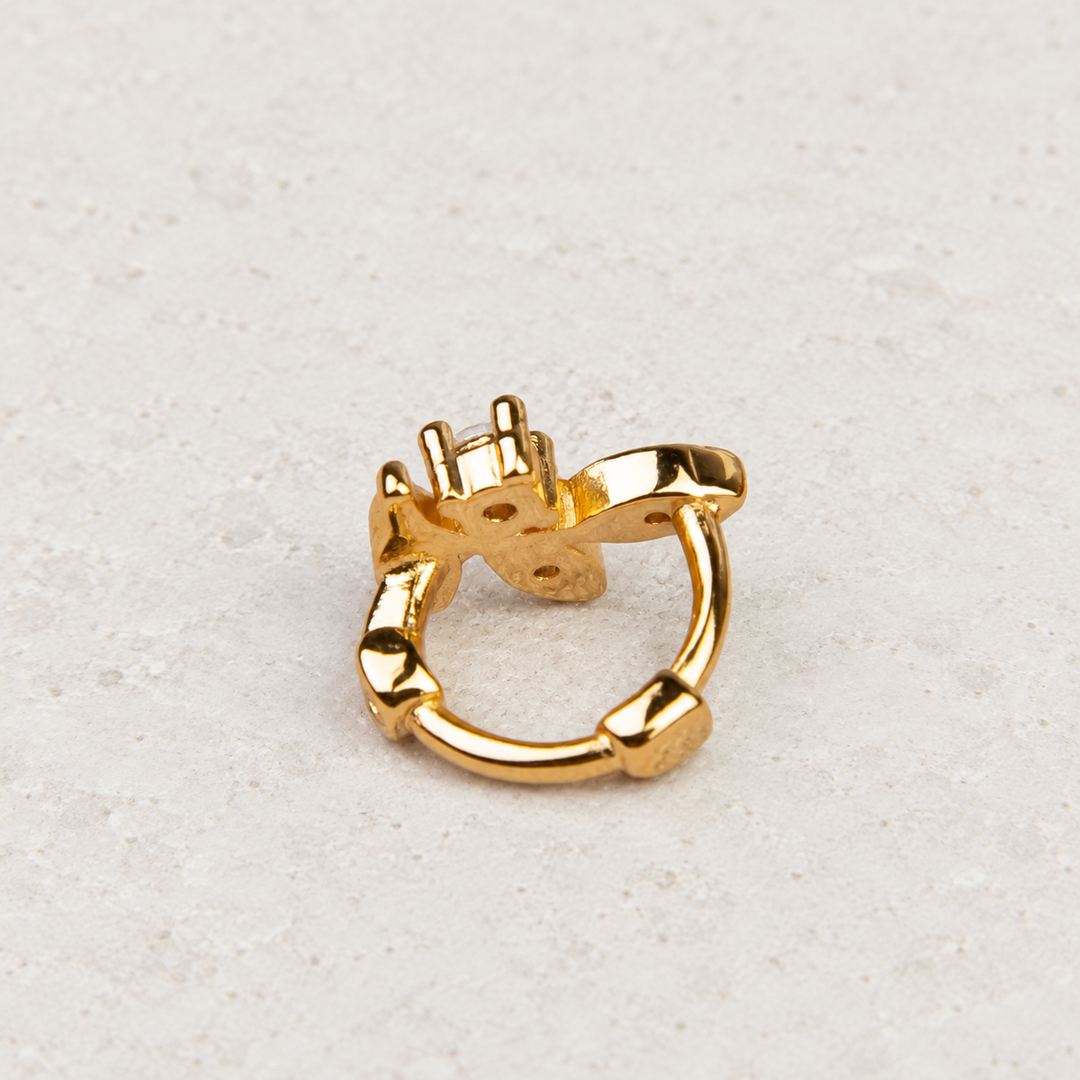 Gold leaf hoop earring clasp detail