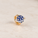 Navy blue planet hoop earring with gold stars, product view — Toku LONDON