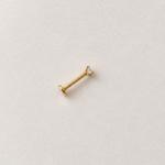 Gold solitaire flat-back piercing stud, product view — Toku LONDON