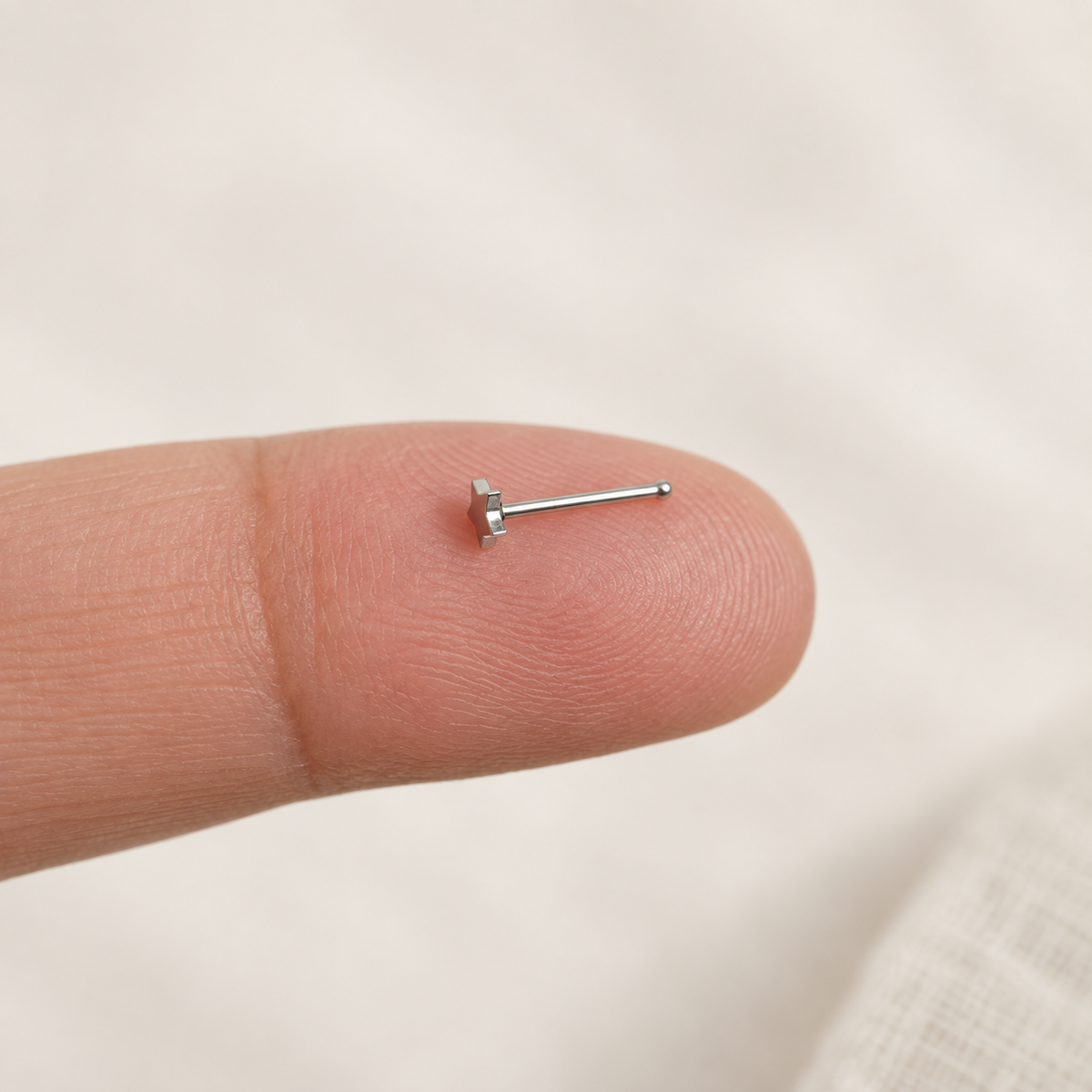 Bone Star Nose Stud in Gold or Silver, Stainless Steel, Pair - product view