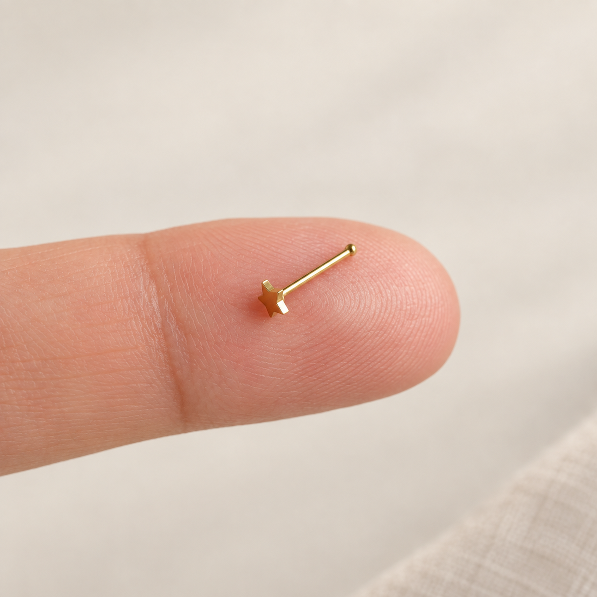 Bone Star Nose Stud in Gold or Silver, Stainless Steel, Pair - product view