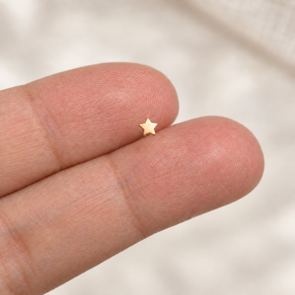 Bone Star Nose Stud in Gold or Silver, Stainless Steel, Pair - Gold variant